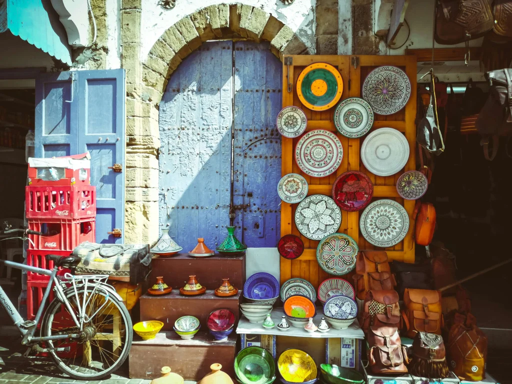 Essaouira coastal day trip from Marrakech showing blue boats and Portuguese ramparts