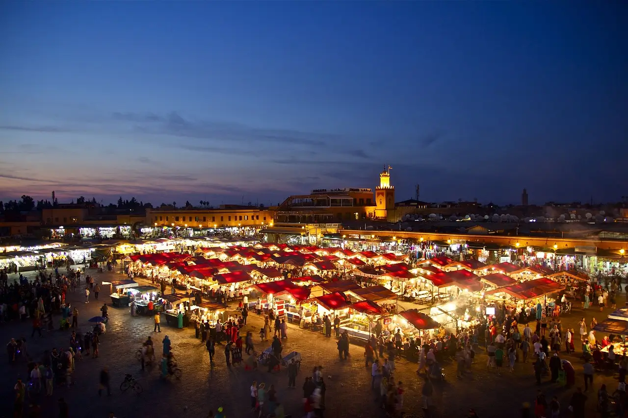 Sunset over Marrakech with Koutoubia Mosque and lively souks